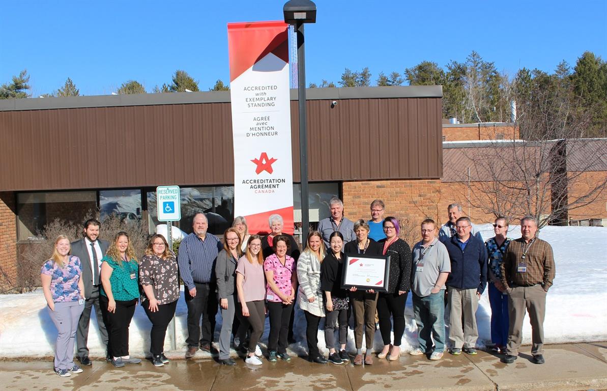 Staff and Board Members at the organization were proud to hang the Accreditation banner outside the front entrance on an unseasonably warm and sunny February afternoon.